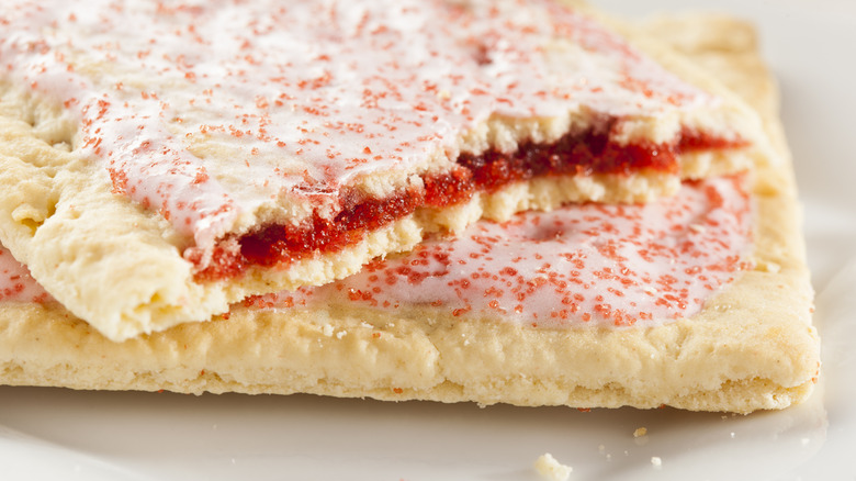 Pink Pop-Tart broken in half exposing red filling