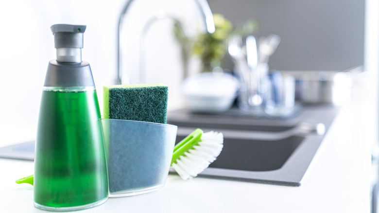 Dish soap next to sink