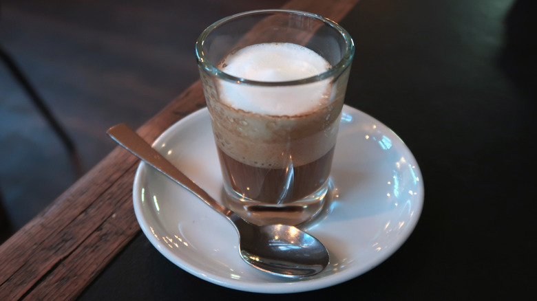 espresso macchiato with a spoon