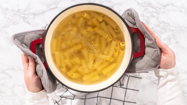 Dutch oven with pasta and water