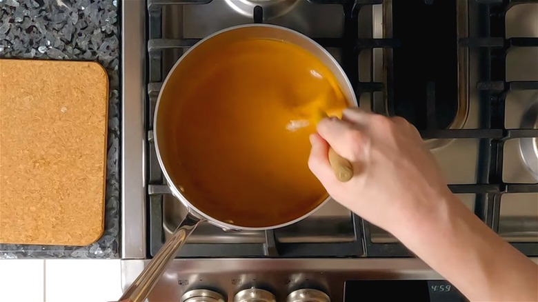 a pot of peanut sauce