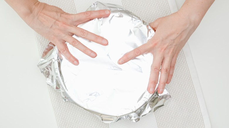 Cake pan covered with foil