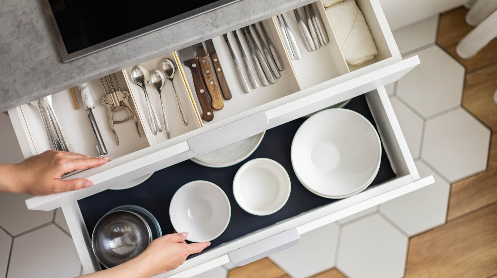 The Easy Parchment Paper Hack For Organizing Your Kitchen Drawers