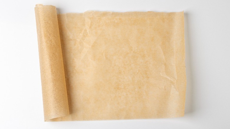 A roll of brown parchment on a kitchen counter