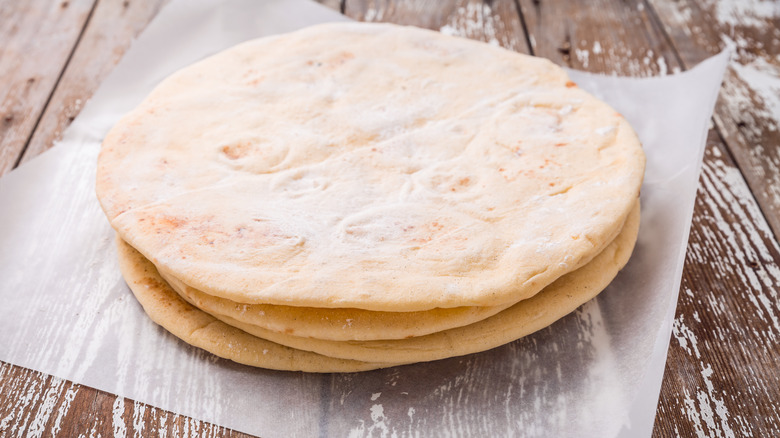 Pita rounds on wood