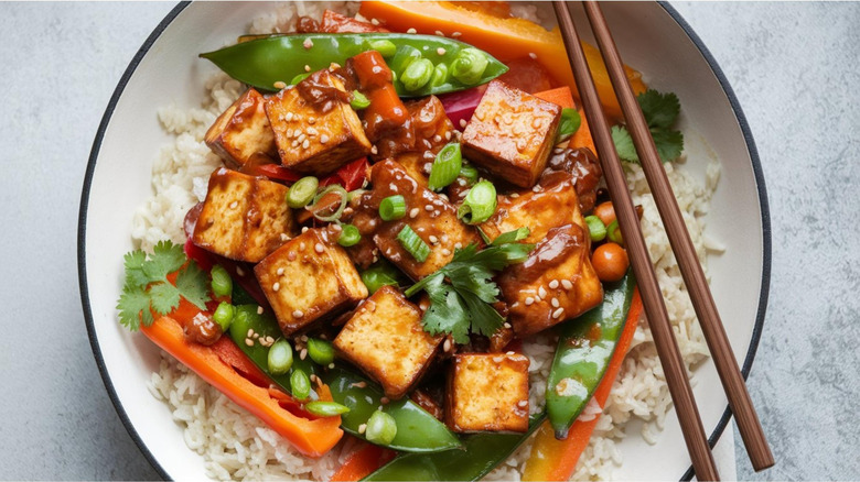 bowl of homemade stir-fry with vegetables and tofu