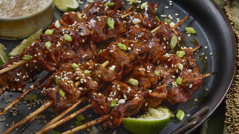 pork satay skewers on plate