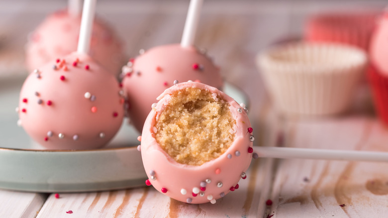 plate of pink cake pops