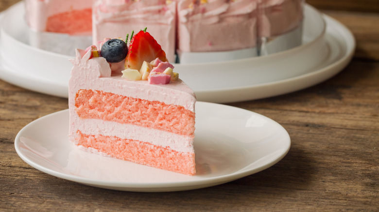 strawberry cake slice on white plate