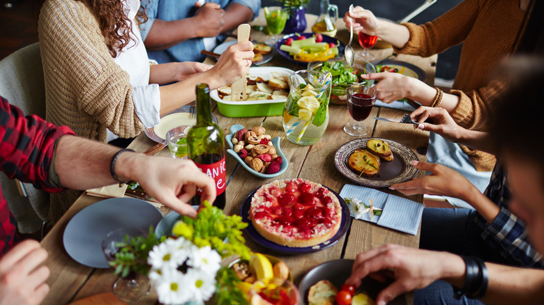 People enjoying party food