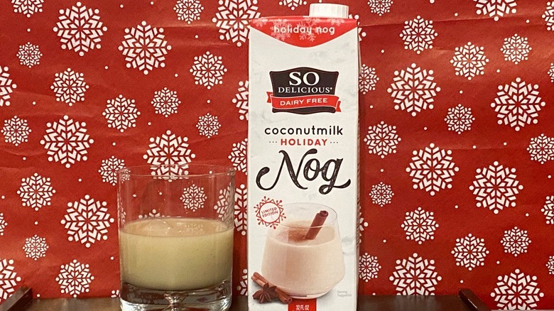 So Delicious Coconutmilk Holiday Nog carton by eggnog glass