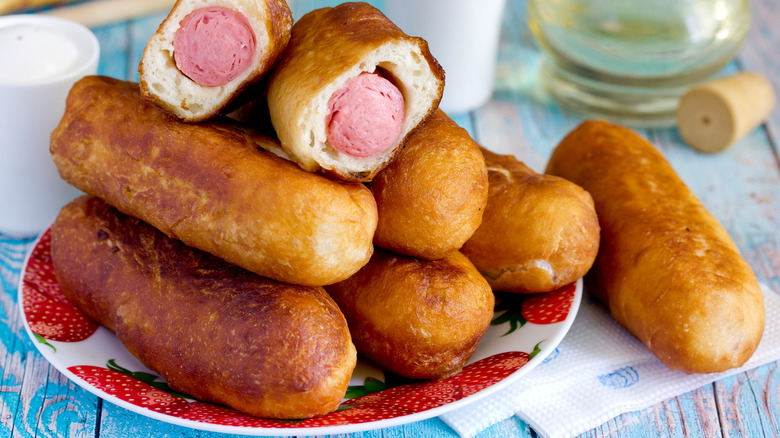 Choux pastry pigs in blankets