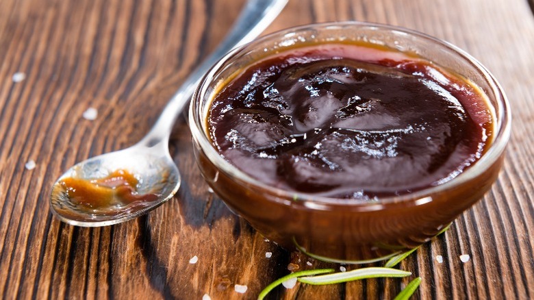 dish of barbecue sauce and spoon