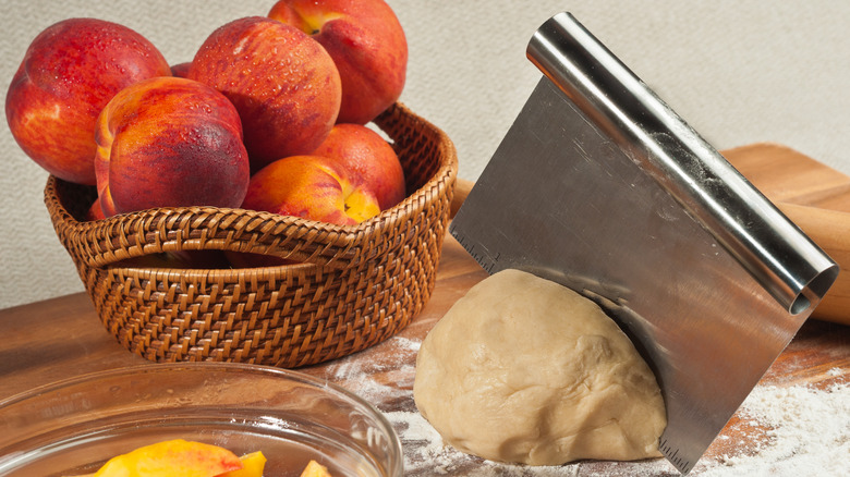 bench scraper cutting dough 