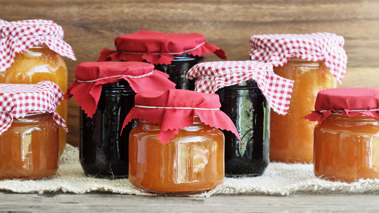 variety of homemade jams in glass jars