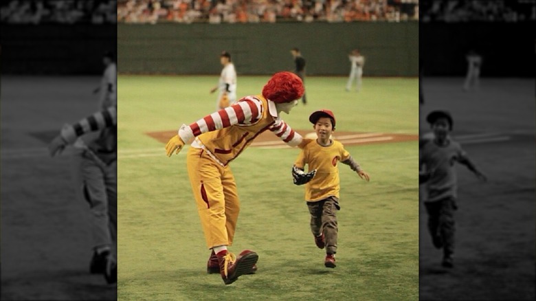 Ronald McDonald with baseball player