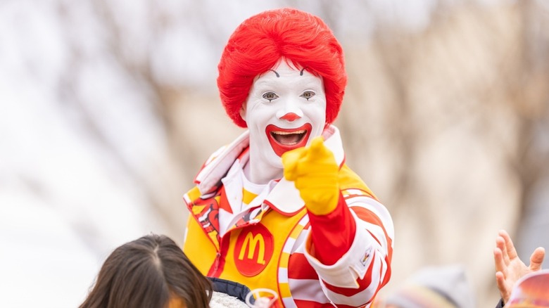Ronald McDonald pointing at camera