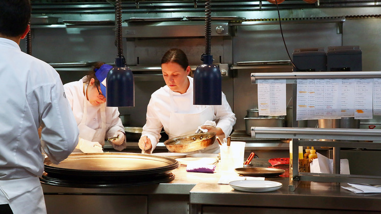 Chef Melissa Rodriguez plating