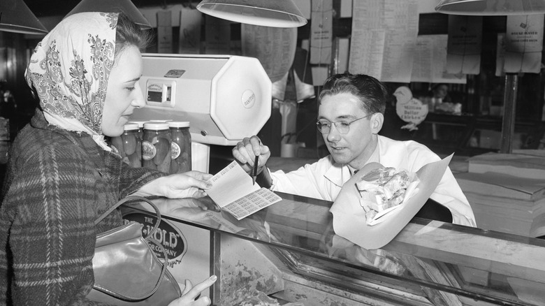 American woman using rationing book