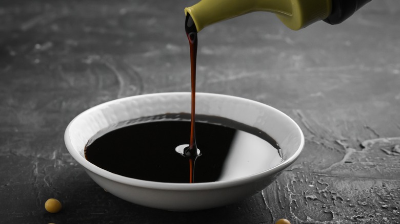 Pouring soy sauce