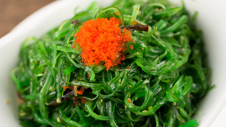 Neon green seaweed salad