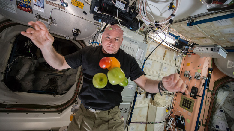 Astronaut Scott Kelly with fresh fruit in space