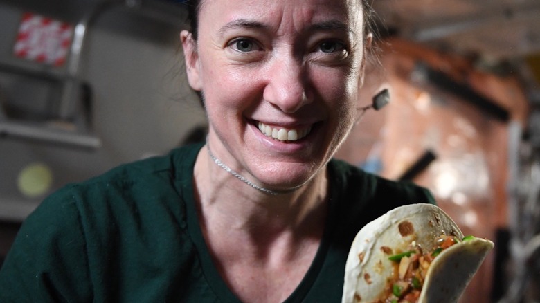 Astronaut Megan McArthur with a space taco