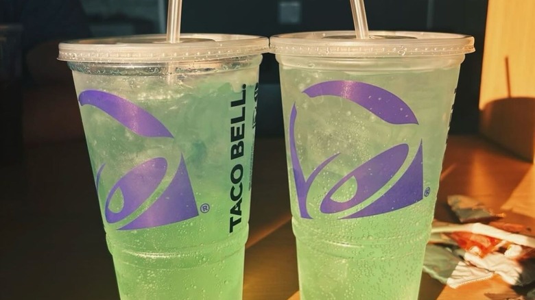 Two Baja Blasts in side-by-side Taco Bell cups