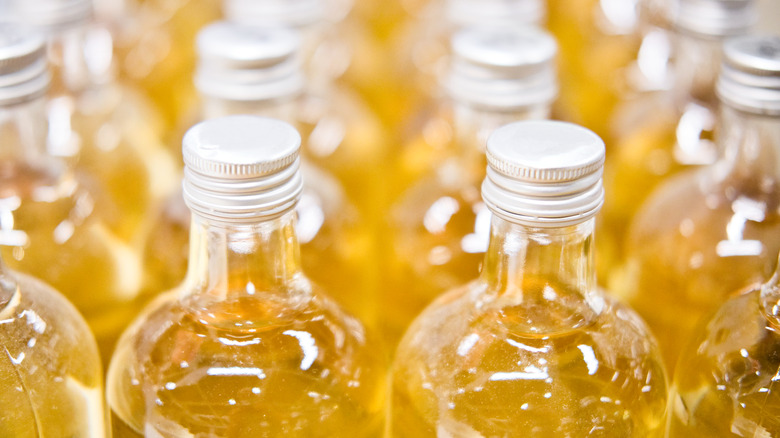 apple juice bottles in rows