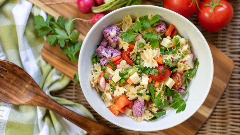 Pasta salad on wooden board