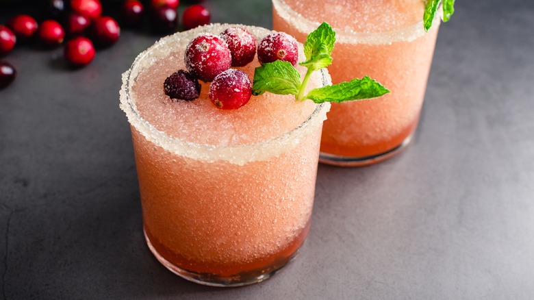 berries sitting atop strawberry margarita