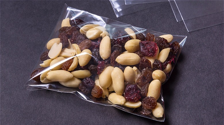 Peanuts and raisins in small clear bag