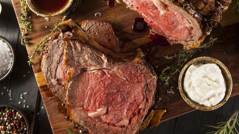 sliced prime rib on cutting board