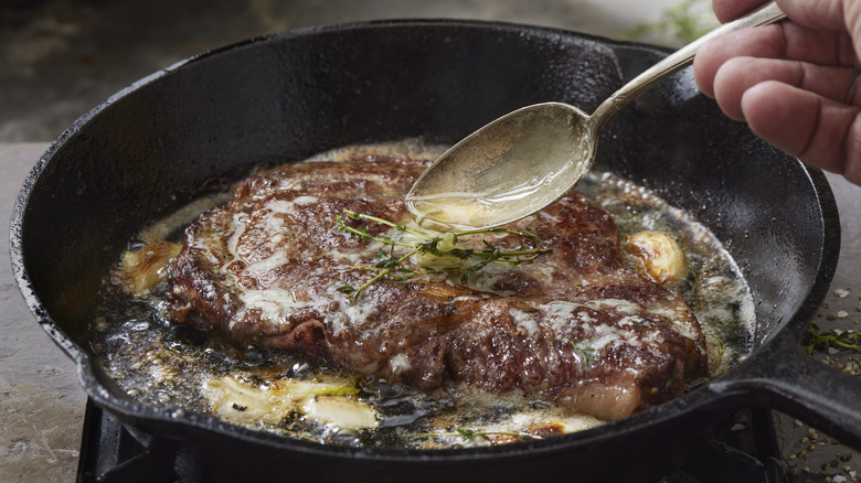 Butter basting steak