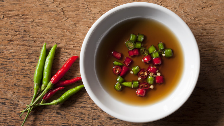 Bowl of fish sauce with chilis