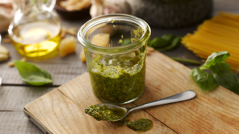 Homemade basil pesto in a jar