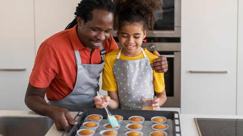 brushing pastries with egg