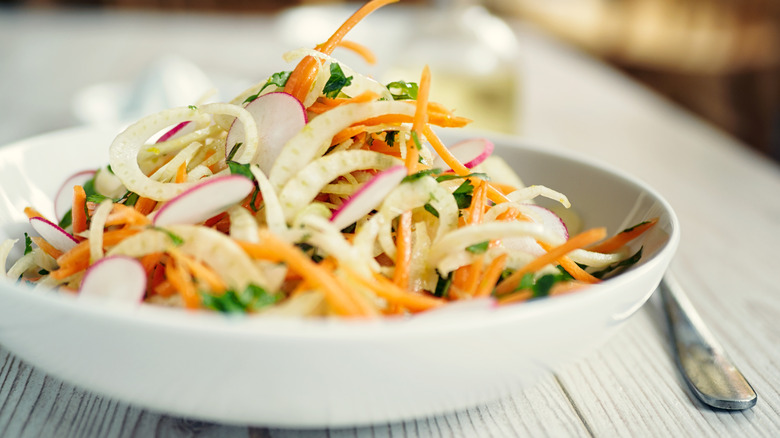 shaved fennel slaw in a bowl