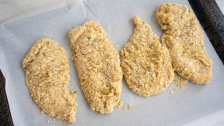 chicken cutlets covered in breadcrumbs