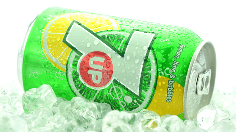 Can of 7Up on it's side in ice