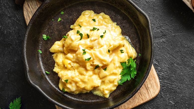 scrambled eggs in a cast iron pan