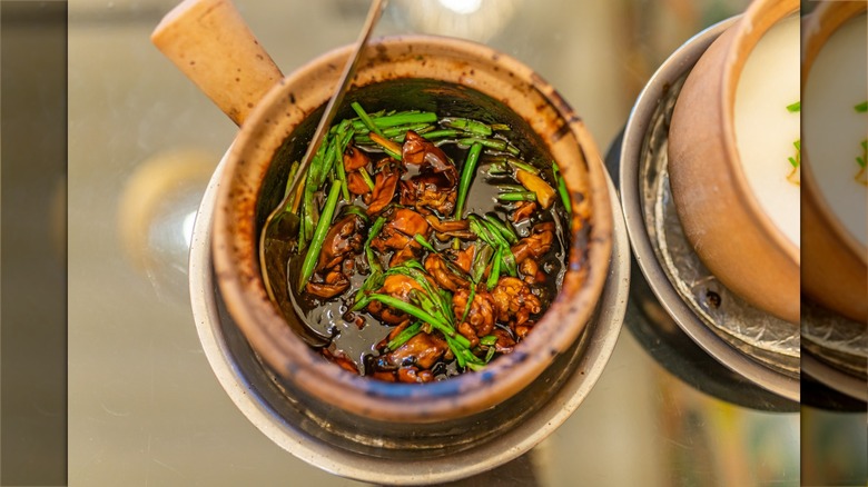 Singaporean frog hot pot porridge