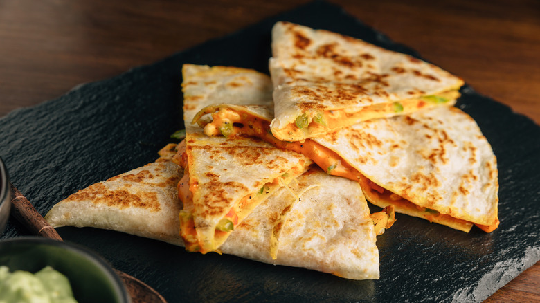 Quesadilla slices on a serving slate