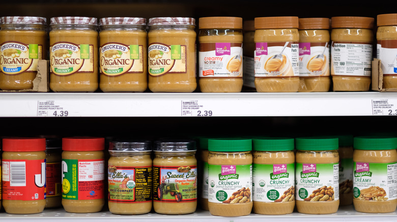 peanut butter jars on supermarket shelf