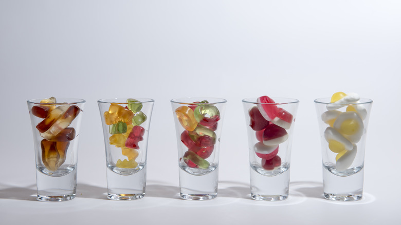 Variety of gummies in shot glasses