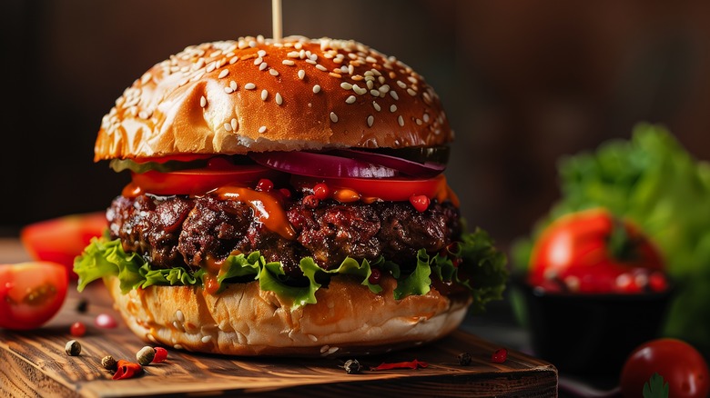 Close-up burger on wooden board