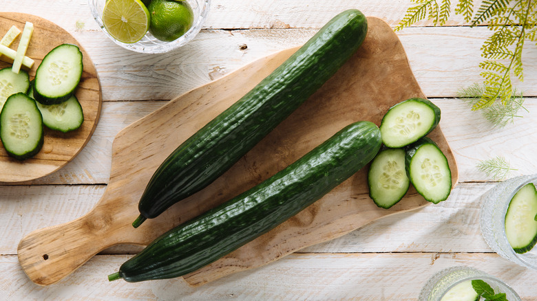 Cucumbers being sliced