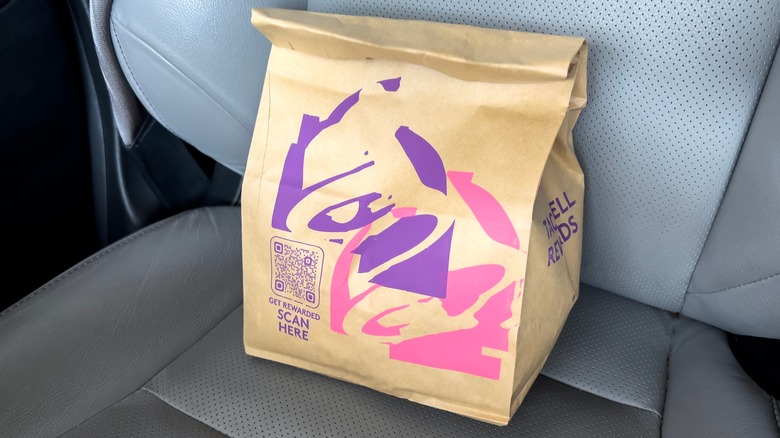 Taco Bell bag on car seat