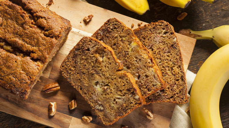 sliced banana bread on wooden board