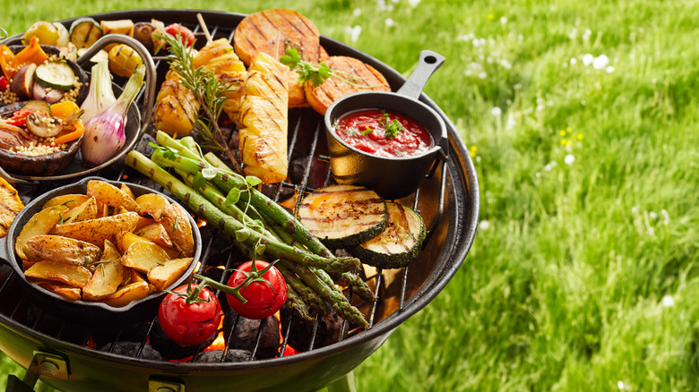A grill piled with veggies